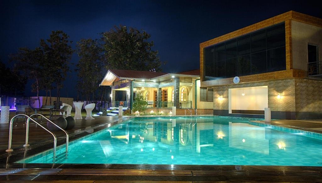 Four Vedas Hotel in silliguri with swimming pool