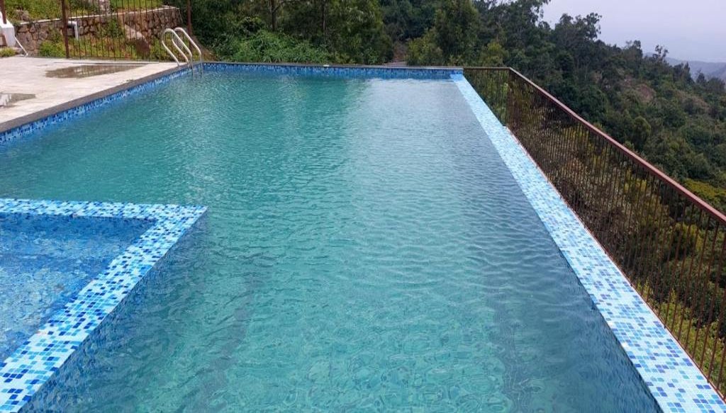 HillTop in green meadows swimming pool hotel yercaud