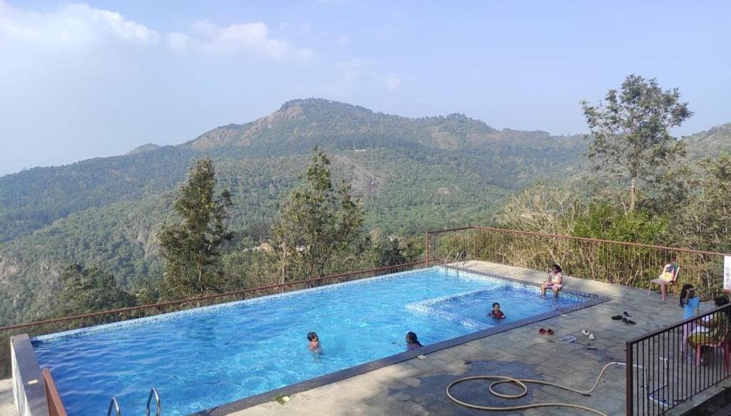 hotels with swimming pool yercaud HillTop in green meadows